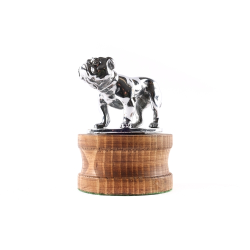 15 - A British Bulldog plated car mascot by Desmo. C.1930s. Mounted on an oval metal plinth. GC-VGC, ligh... 