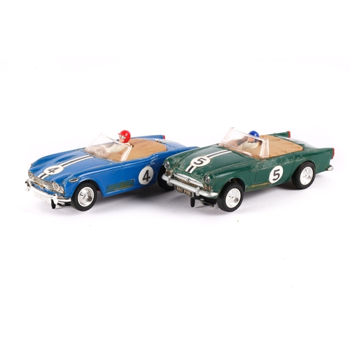 220 - 2 Scalextric cars. Sunbeam Tiger in green with racing No.5 and a Triumph Tr4/A in blue with racing N... 