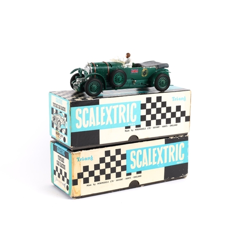 226 - A Scalextric  C64 Bentley in green, with driver, head lamp lenses are detached but present. Boxed wi... 