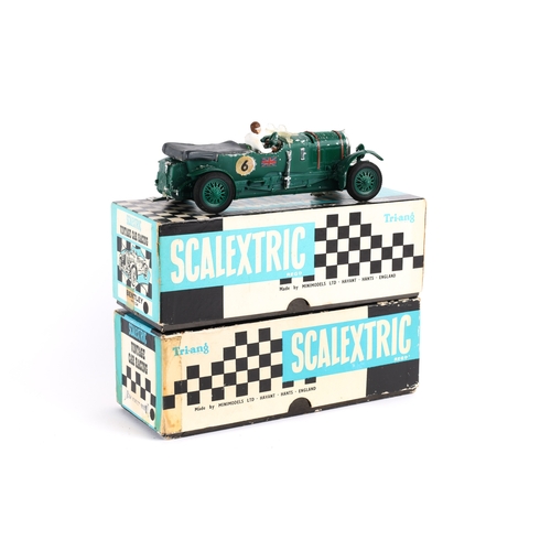 226 - A Scalextric  C64 Bentley in green, with driver, head lamp lenses are detached but present. Boxed wi... 