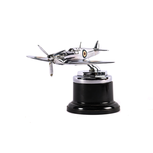 27 - A scarce SPITFIRE car mascot with the  original chrome plating. Has intact roundels and a working pr... 