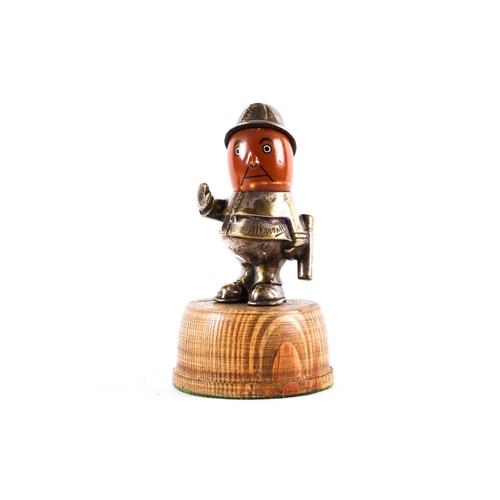 28 - A rare  Policeman Car mascot by HASSELL, nickel plated body and helmet, ceramic head some wear to th... 