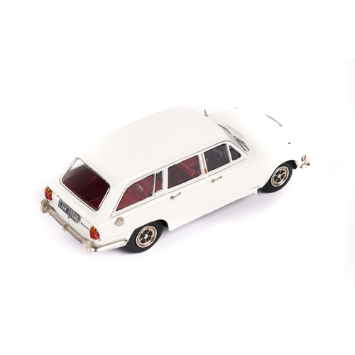 285 - A Crossway Models white metal Triumph 2000 Estate. In white with red interior, Ro-Style wheels and b... 