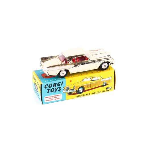 316 - Corgi Toys Studebaker Golden Hawk (211S). In vacuum plated gold with white flash and red interior, s... 