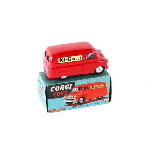 321 - Corgi Toys Mechanical Bedford 12CWT Van K.L.G. Plugs (401M). In bright red livery with K.L.G. PLUGS ... 