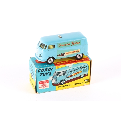 328 - Corgi Toys Volkswagen Toblerone Van (441). In light blue Chocolat Tobler livery, with yellow interio... 