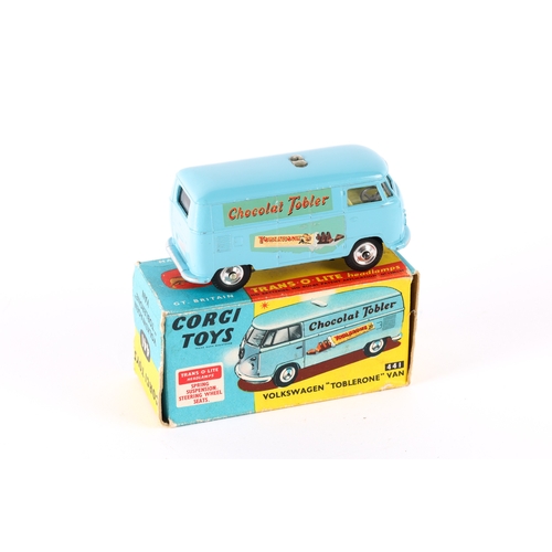 328 - Corgi Toys Volkswagen Toblerone Van (441). In light blue Chocolat Tobler livery, with yellow interio... 