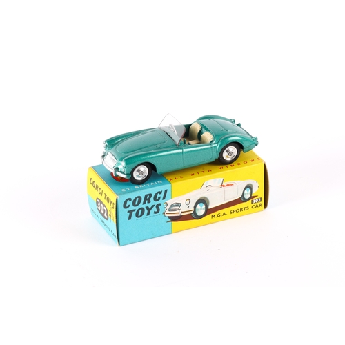 330 - Corgi Toys M.G.A. Sports car (302). A late example in metallic green with cream seats, screen and si... 