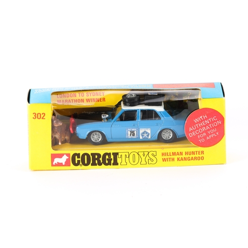 338 - Corgi Toys Hillman Hunter With Kangaroo (302). In mid blue with satin black bonnet, red plastic roo ... 