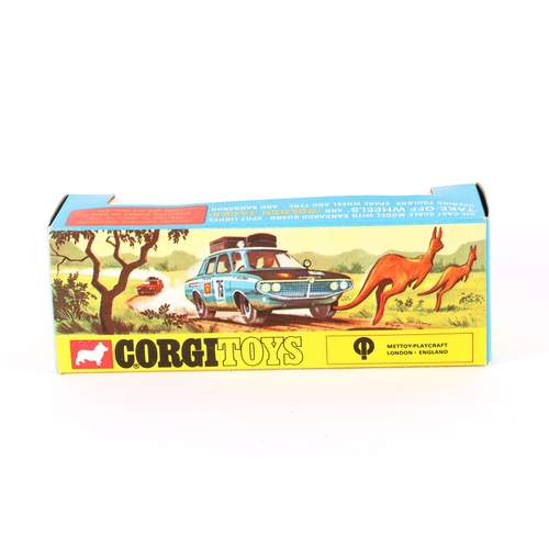 338 - Corgi Toys Hillman Hunter With Kangaroo (302). In mid blue with satin black bonnet, red plastic roo ... 