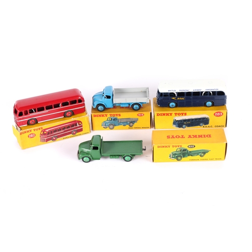 374 - 4 Dinky Toys. Dodge Rear Tipping Wagon (414). In blue and grey. Fordson Thames Flat Truck (422). In ... 