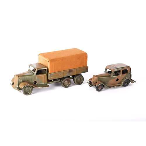 421 - 2 scarce Tri-ang Minic Pre-War Vehicles. A Six Wheel Army Canvas Tilt Lorry 69M CF. A 6 wheeled lorr... 