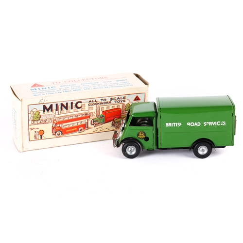 423 - A Tri-ang Minic British Road Services Van 124M. In dark green livery, die-cast wheels with black tyr... 