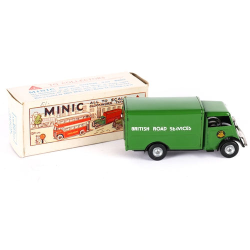 423 - A Tri-ang Minic British Road Services Van 124M. In dark green livery, die-cast wheels with black tyr... 