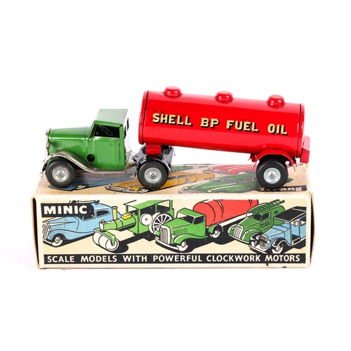 424 - A Tri-ang Minic Mechanical Horse And Fuel Oil Trailer 31M. Cab in dark green with plated mudguards, ... 