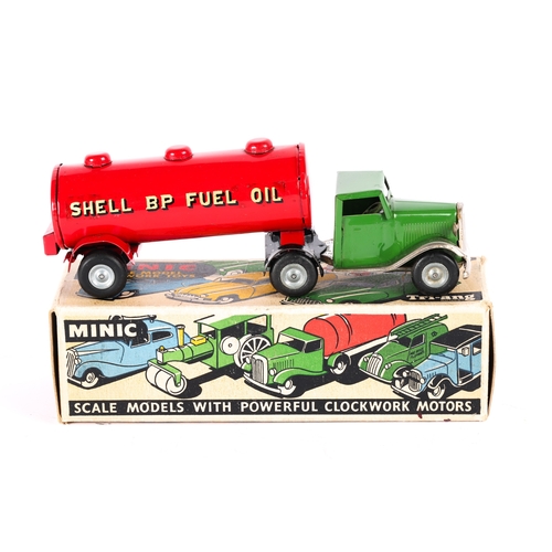 424 - A Tri-ang Minic Mechanical Horse And Fuel Oil Trailer 31M. Cab in dark green with plated mudguards, ... 