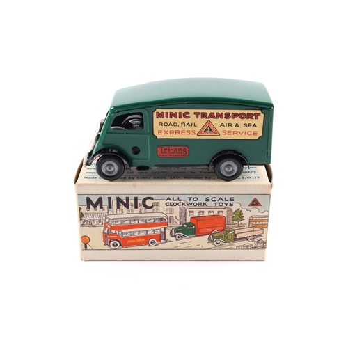 426 - A Tri-ang Minic clockwork Short Bonnet Shutter Van 103M. An example in dark green (a rare colour), u... 