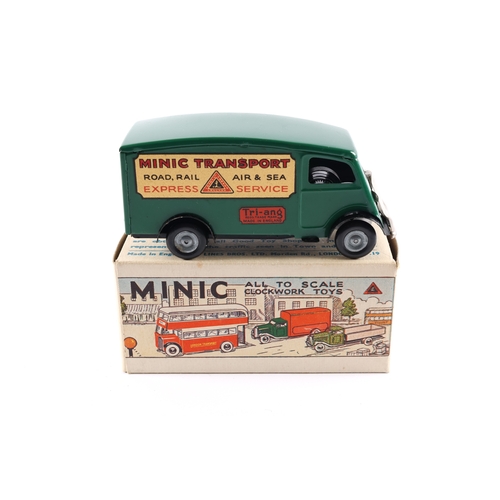 426 - A Tri-ang Minic clockwork Short Bonnet Shutter Van 103M. An example in dark green (a rare colour), u... 