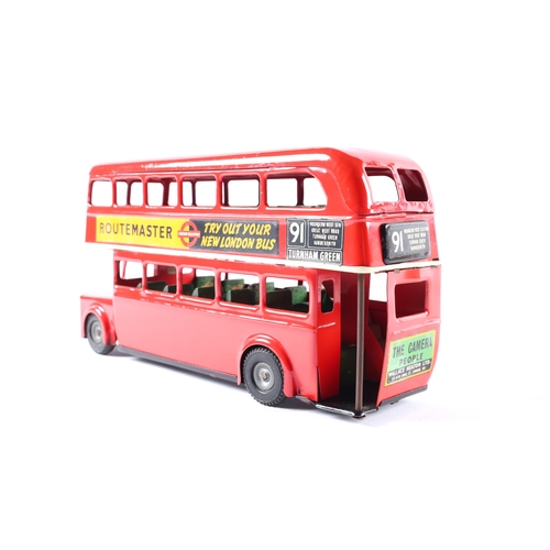 434 - A late issue Tri-ang Minic friction powered Routemaster double decker bus M214 II version. A 'push-a... 