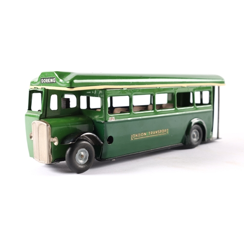 435 - A late issue Tri-ang Minic clockwork powered single deck bus 52M. In two tone green London Transport... 