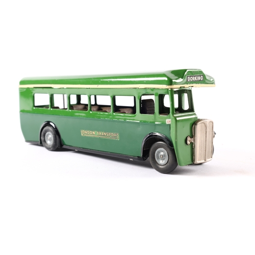 435 - A late issue Tri-ang Minic clockwork powered single deck bus 52M. In two tone green London Transport... 