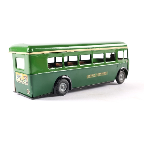 435 - A late issue Tri-ang Minic clockwork powered single deck bus 52M. In two tone green London Transport... 