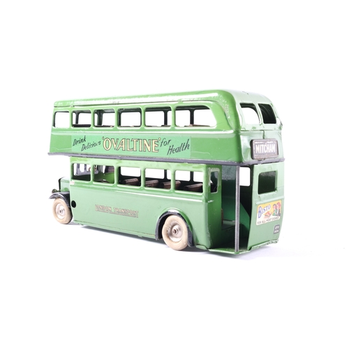 446 - A scarce early issue Tri-ang Minic clockwork powered double decker bus.60M. An example in two tone g... 