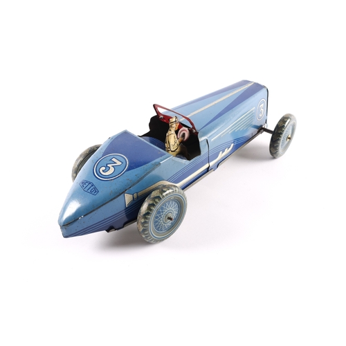 459 - An impressively large Mettoy tinplate clockwork single seat racing car, 32cm overall length. In the ... 