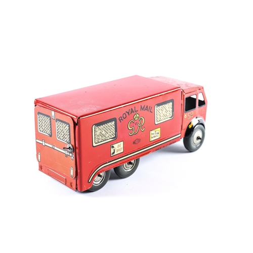 461 - A large Mettoy clockwork tinplate AEC style 3 axle 6 wheel Royal Mail Van. 25cm. In red and yellow G... 