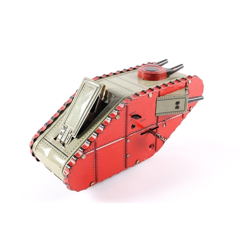 464 - A MARX tinplate clockwork WWI style 'Male' tank. Finished in light grey and red with black detailing... 