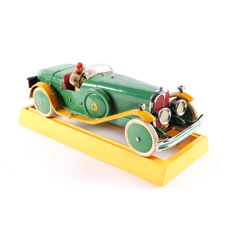 478 - A rare 1930's No.2 Meccano Constructor Car. A long body round tail example in green with yellow mudg... 