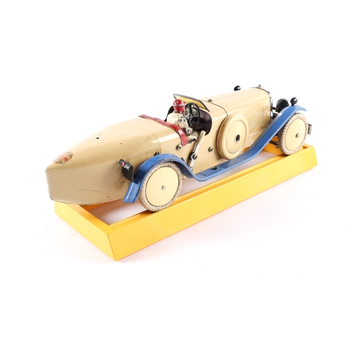 479 - A rare 1930's No.2 Meccano Constructor Car. A boat tail example in cream with blue mudguards, red se... 