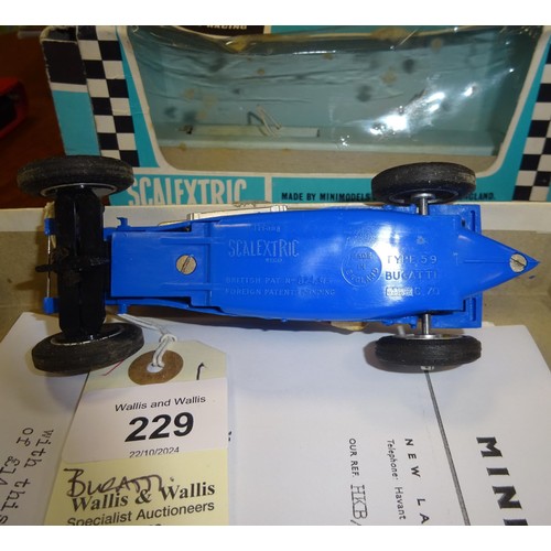 229 - An extremely scarce Scalextric 1934 Bugatti in blue with driver. Contained in its original slide out... 