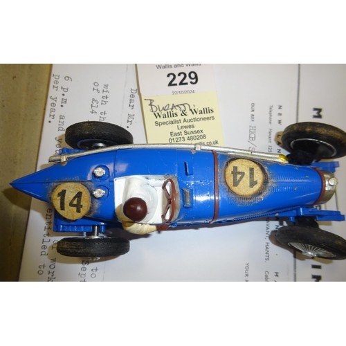 229 - An extremely scarce Scalextric 1934 Bugatti in blue with driver. Contained in its original slide out... 