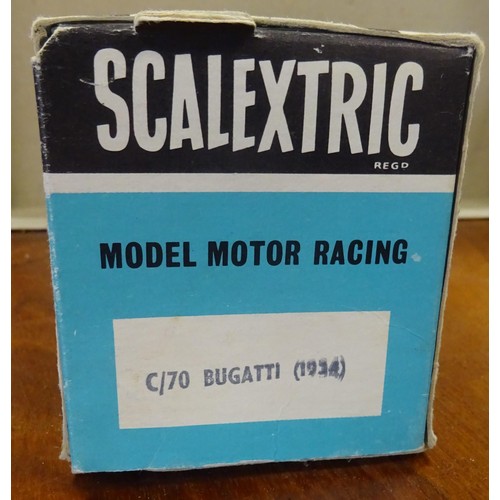 229 - An extremely scarce Scalextric 1934 Bugatti in blue with driver. Contained in its original slide out... 