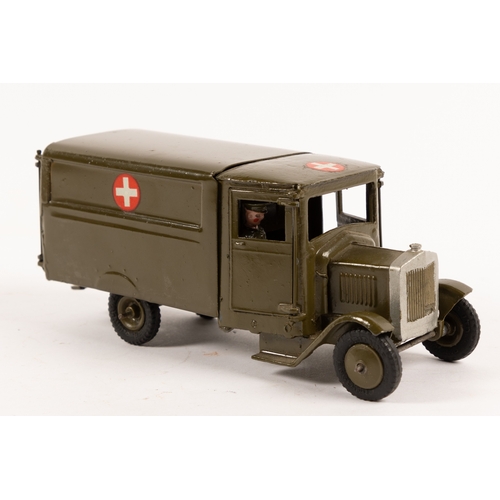 121 - A pre-war Britains Army Ambulance (1512). With driver and wounded man on stretcher, black rubber tyr... 