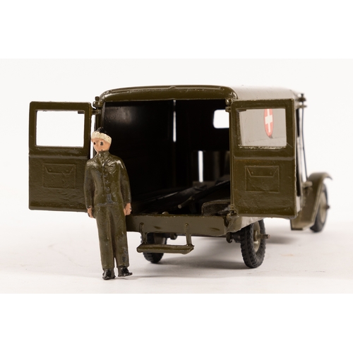 121 - A pre-war Britains Army Ambulance (1512). With driver and wounded man on stretcher, black rubber tyr... 