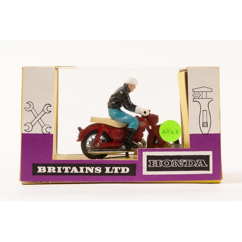 126 - A scarce Britains 9687 HONDA  motorcycle in red with rider dressed in black top with light blue trou... 