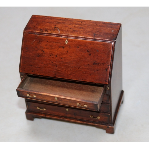 18 - A very impressive miniature wooden Bureau in the early Victorian style, Has an opening flap that can... 