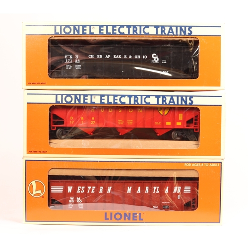 183 - Lionel Electric Trains 3-rail O gauge American outline locomotive and 3 freight cars. A Dash-8 twin ... 