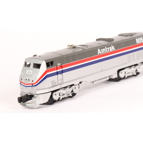 191 - An M.T.H. Electric Trains 3-rail O gauge American outline Amtrak train set. Compiled from individual... 