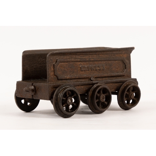 195 - A Henry Woolwork & Co, cast iron locomotive with tender and 3 coaches. dating from the late 19th cen... 