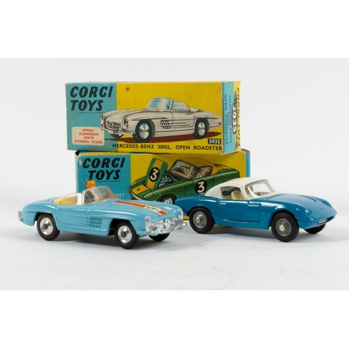 237 - 2 Corgi Toys.  Lotus Elan Coupe (319). An example in mid blue with white roof and interior, with det... 