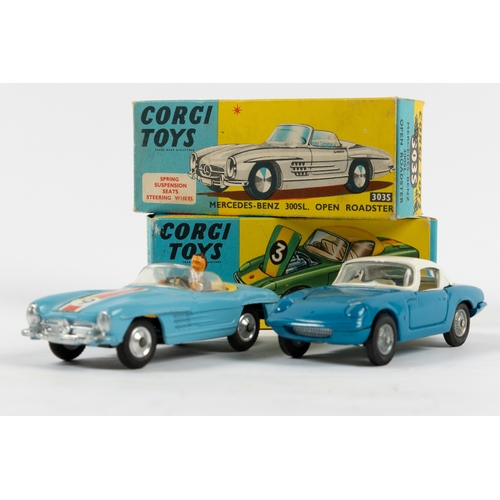 237 - 2 Corgi Toys.  Lotus Elan Coupe (319). An example in mid blue with white roof and interior, with det... 