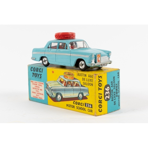 247 - Corgi Toys Motor School Car (236). An Austin A60 in light blue with red interior, with figures and r... 