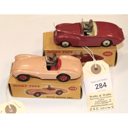 284 - 2 Dinky Toys. Sunbeam Alpine Sports (101). An example in cerise with cream interior and wheels, comp... 