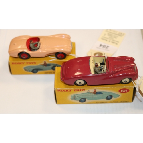 284 - 2 Dinky Toys. Sunbeam Alpine Sports (101). An example in cerise with cream interior and wheels, comp... 