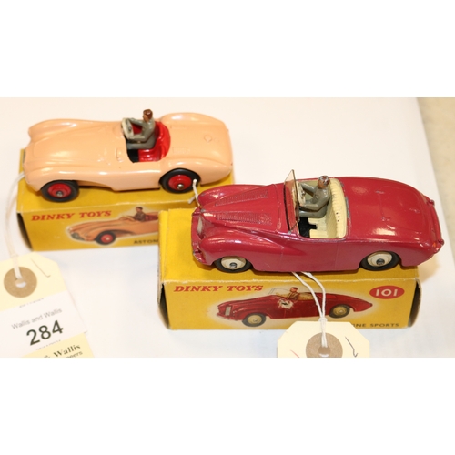 284 - 2 Dinky Toys. Sunbeam Alpine Sports (101). An example in cerise with cream interior and wheels, comp... 