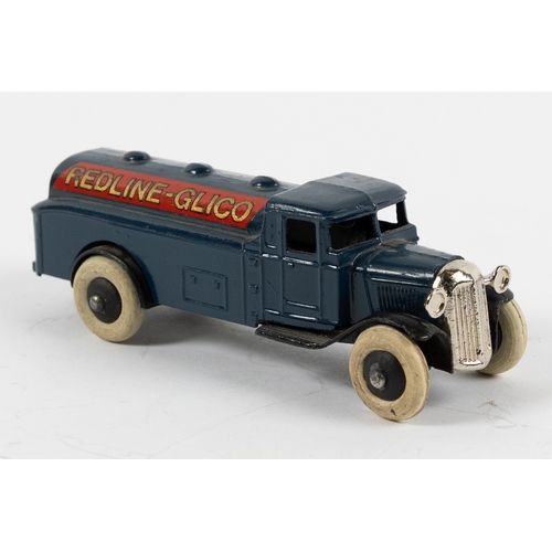 304 - Dinky Toys 25D fuel tanker finished in navy blue with black chassis. REDLINE-GLICO transfers applied... 