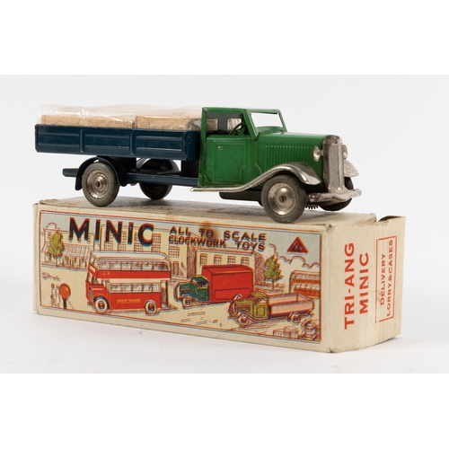 327 - A Tri-ang Minic delivery lorry & cases, with green cab and blue chassis and open back. Wooden crates... 